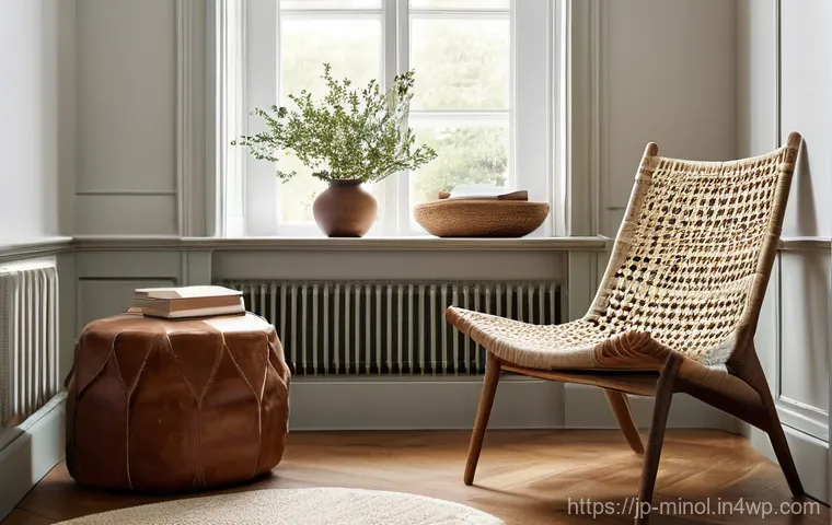 미니멀 인테리어의 차별화된 접근법 - **"Curated Comfort: The Vintage Armchair's Story"** A minimalist living room interior, bathed in...
