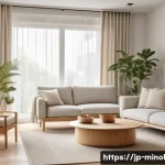 미니멀 인테리어 색상 조합 가이드 - A serene minimalist living room featuring neutral tones of white, beige, and light gray; soft linen ...